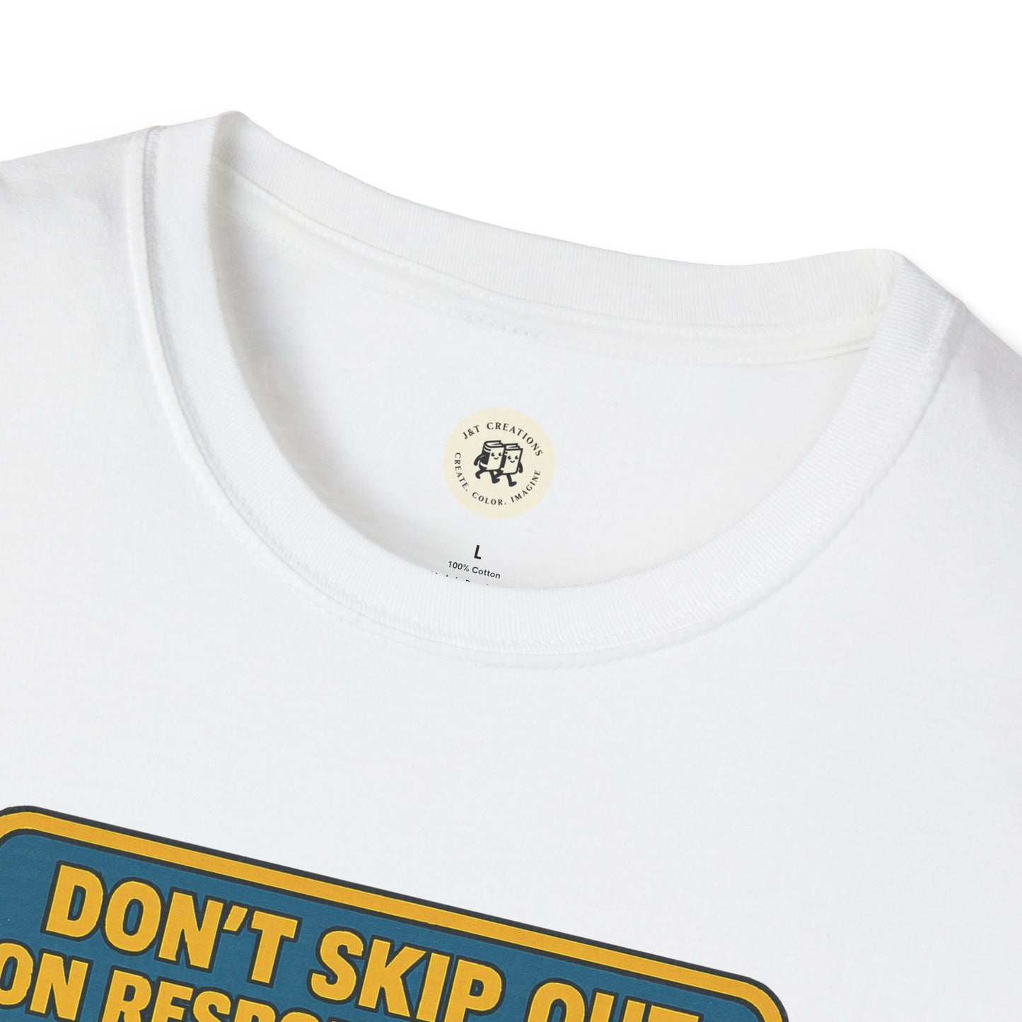 Close-up of white Printify Tom Sawyer vintage t-shirt with yellow and blue text design