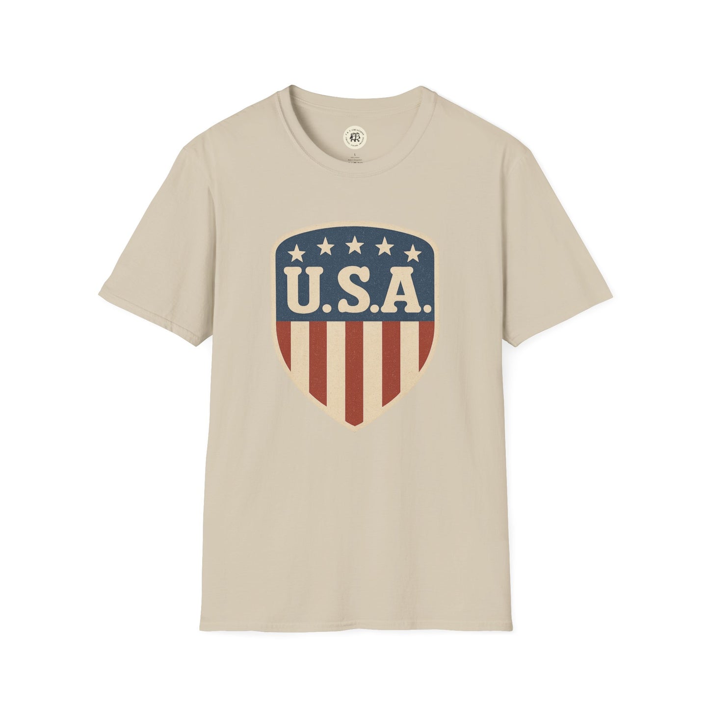 Beige Printify USA shield t-shirt with blue stars and red stripes patriotic design