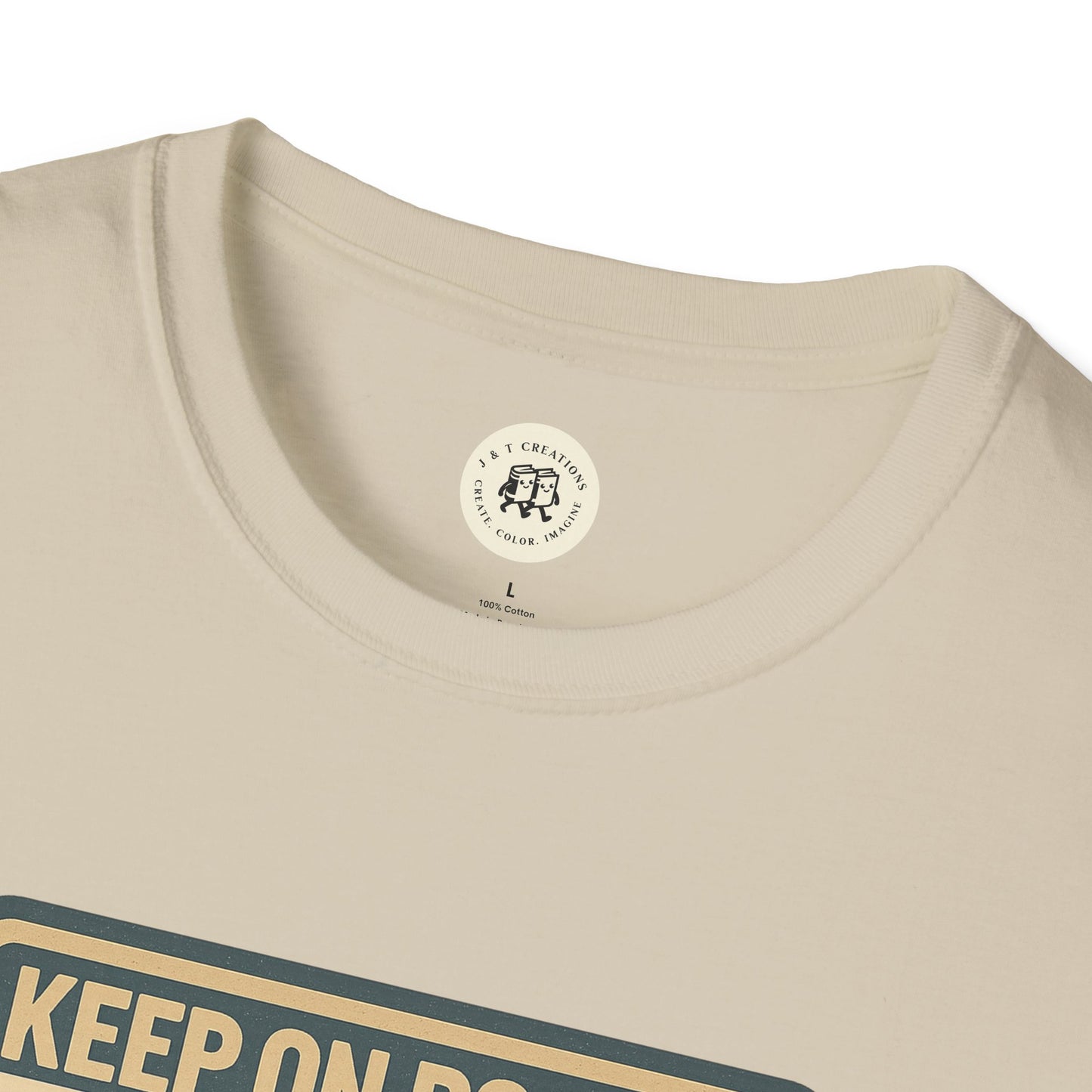 Close-up of beige Keep on Rockin in the Free World t-shirt collar and print by Printify