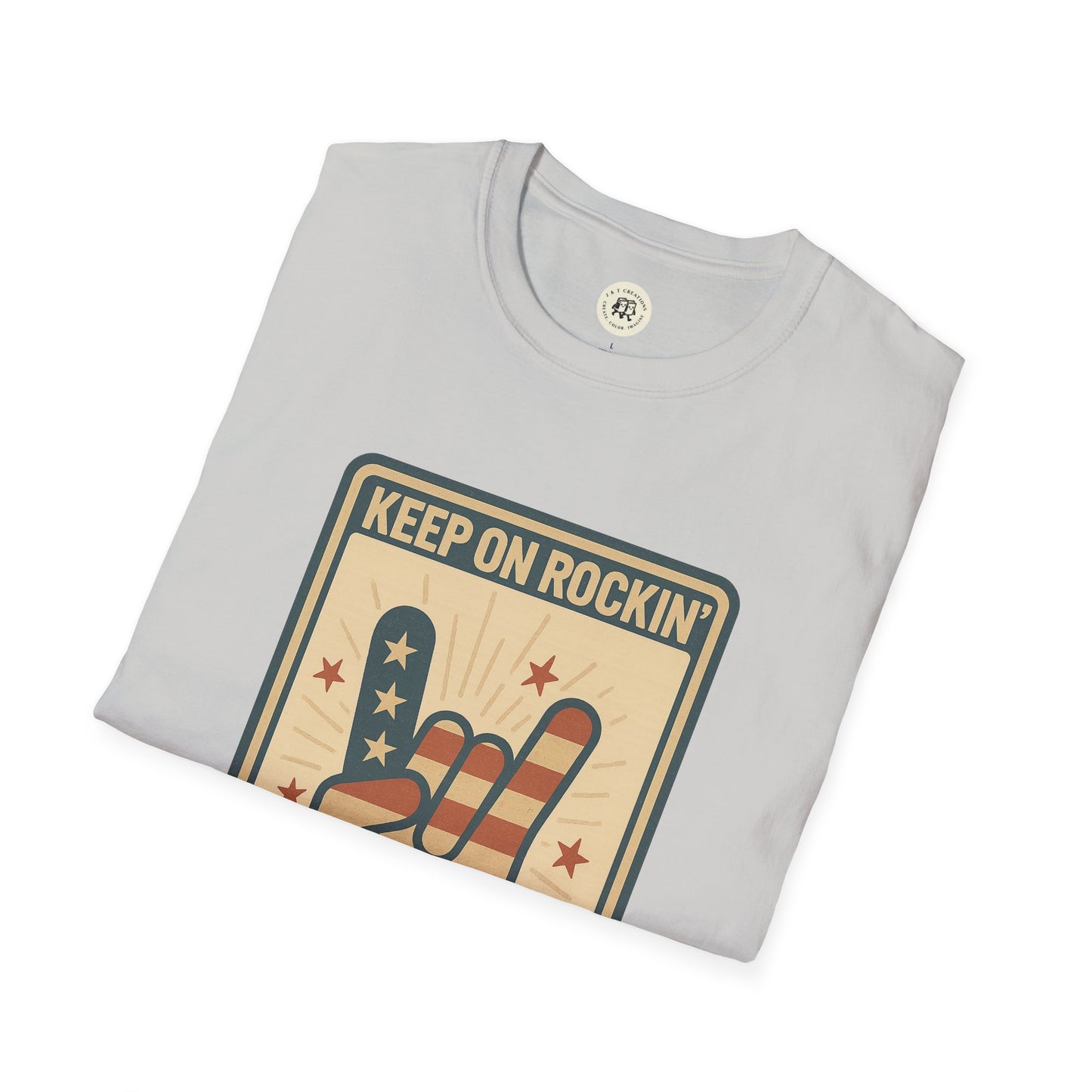 White Keep on Rockin in the Free World t-shirt with American flag rock hand graphic folded