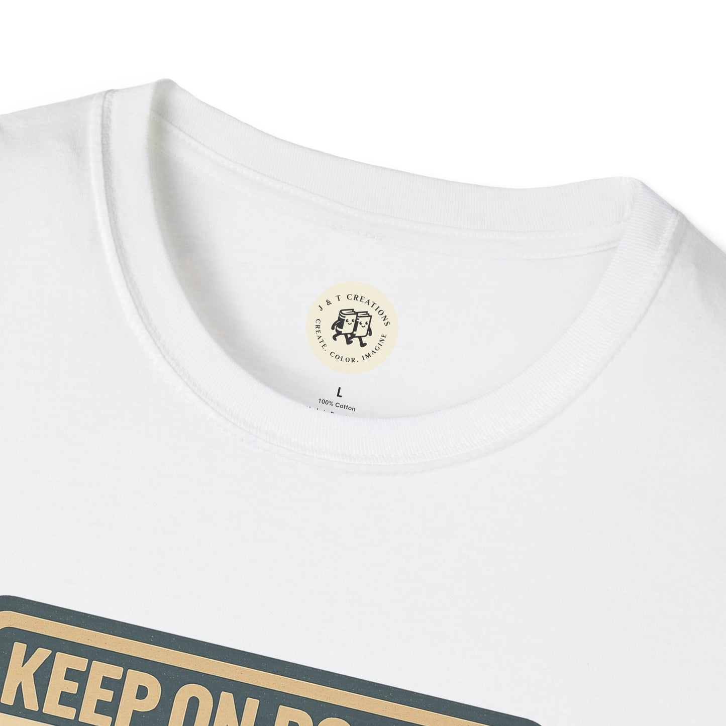 Close-up of Printify Keep on Rockin in the Free World t-shirt collar and upper chest print on white fabric