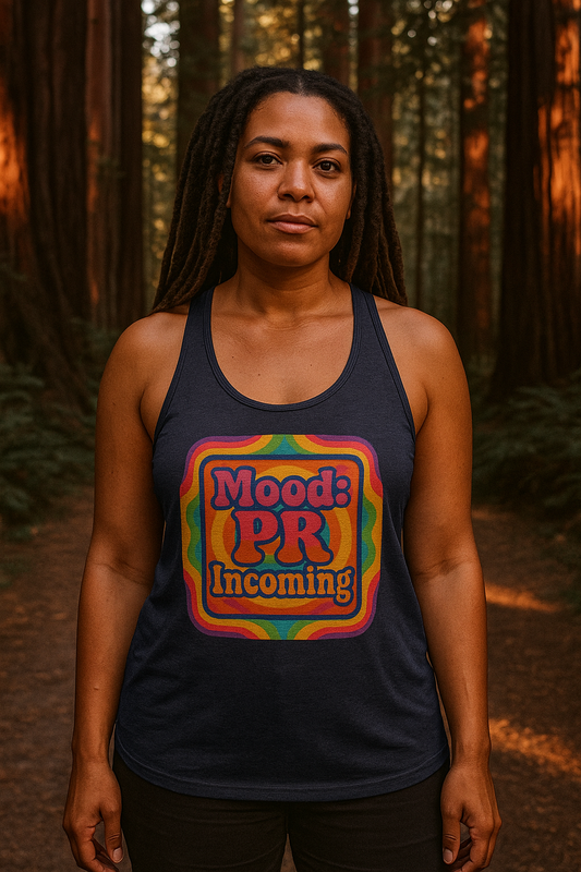 Printify black tank top with colorful mood inspiration fitness shirt graphic worn by woman in forest