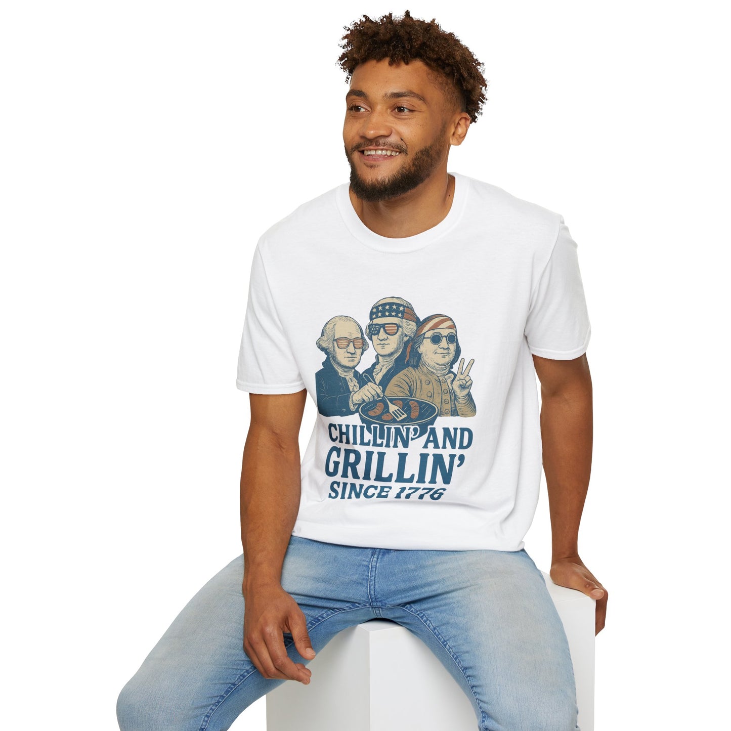 Printify vintage 4th of July t-shirt with Chillin and Grillin graphic worn by man sitting