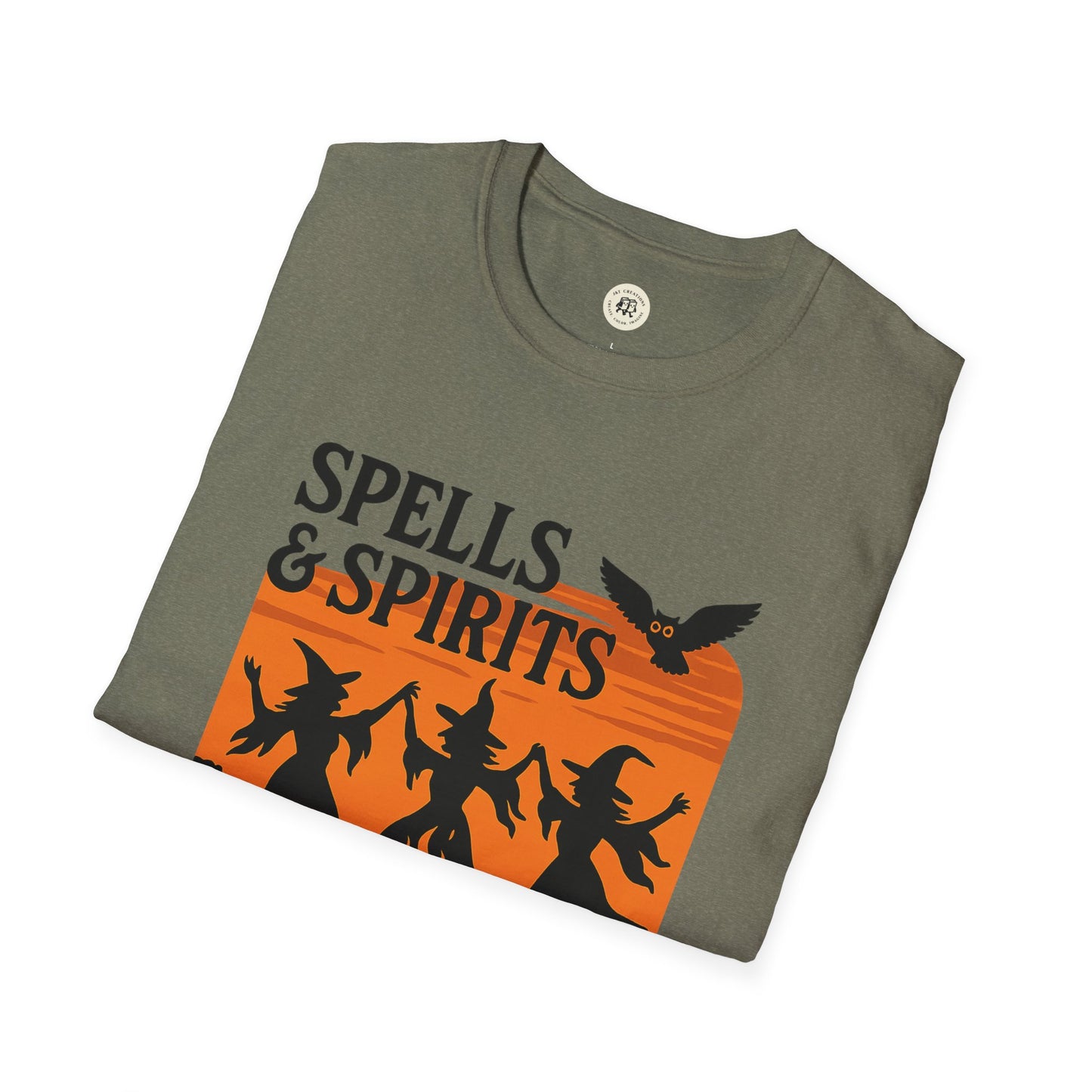 Olive folded tee with Spells and Spirits witches and owl over orange sunset spooky vibes unisex halloween t-shirt