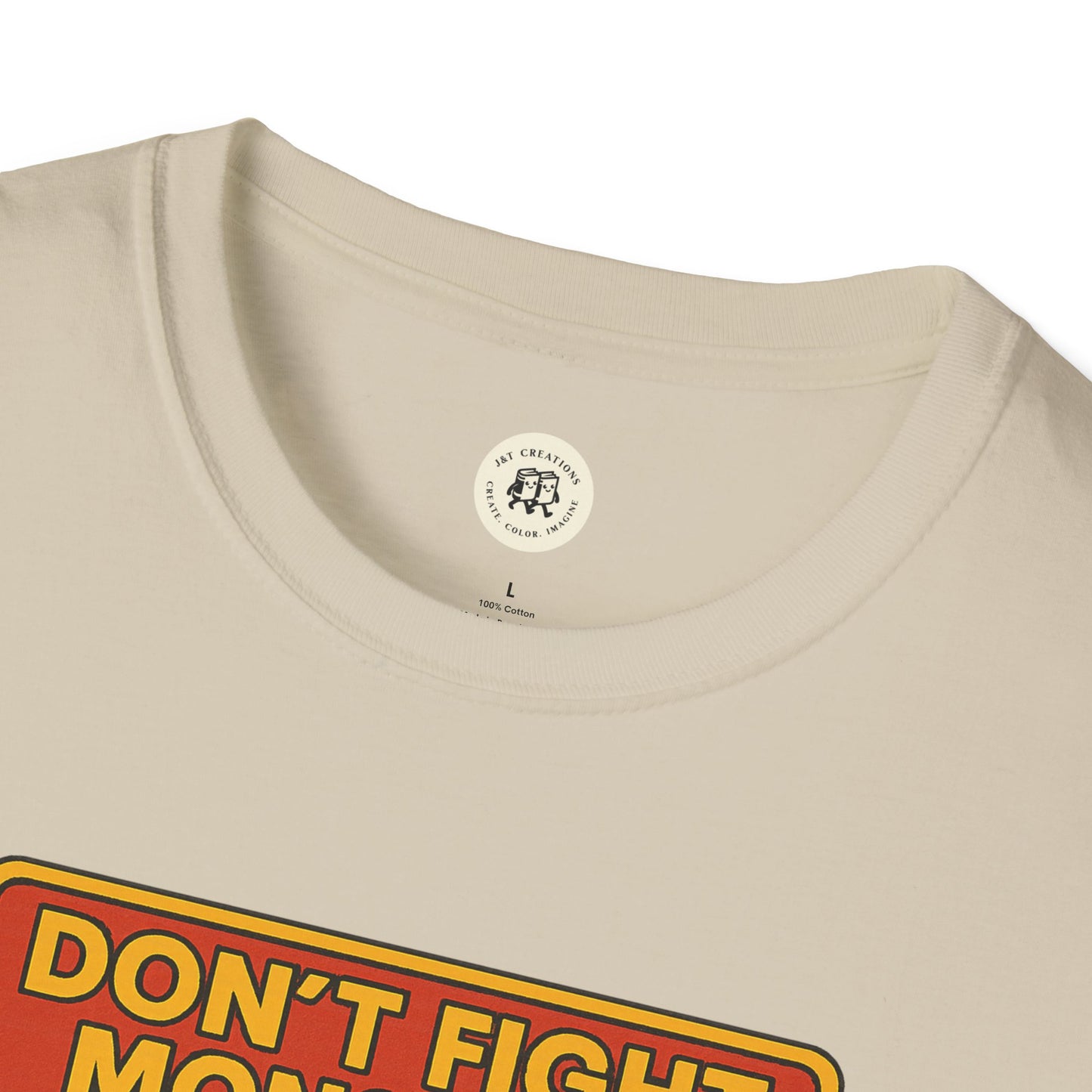 Close-up of beige Beowolf bravery t-shirt by Printify with bold graphic text design