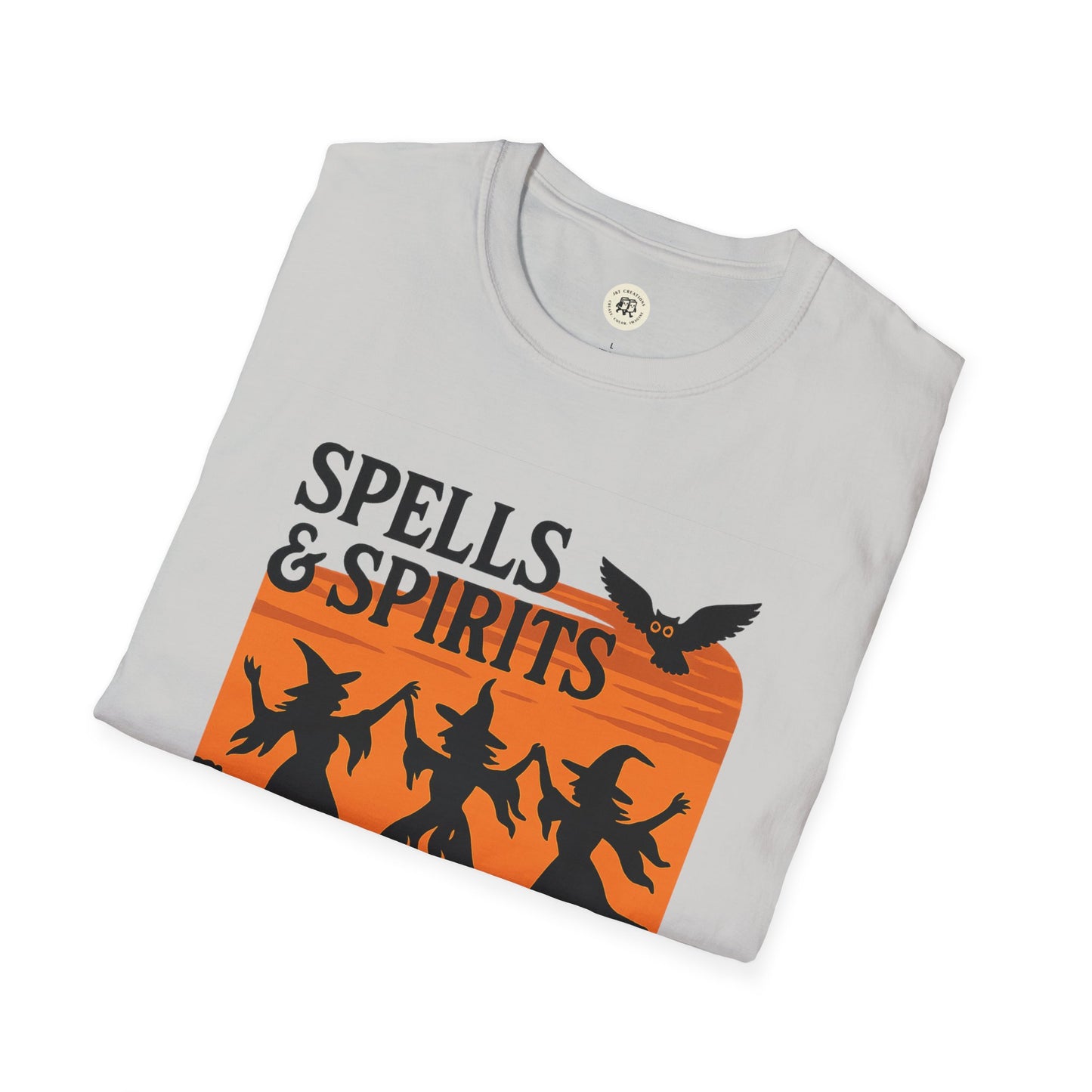 Folded gray tee with orange witch silhouettes and owl graphic reading SPELLS and SPIRITS spooky vibes unisex halloween t-shirt
