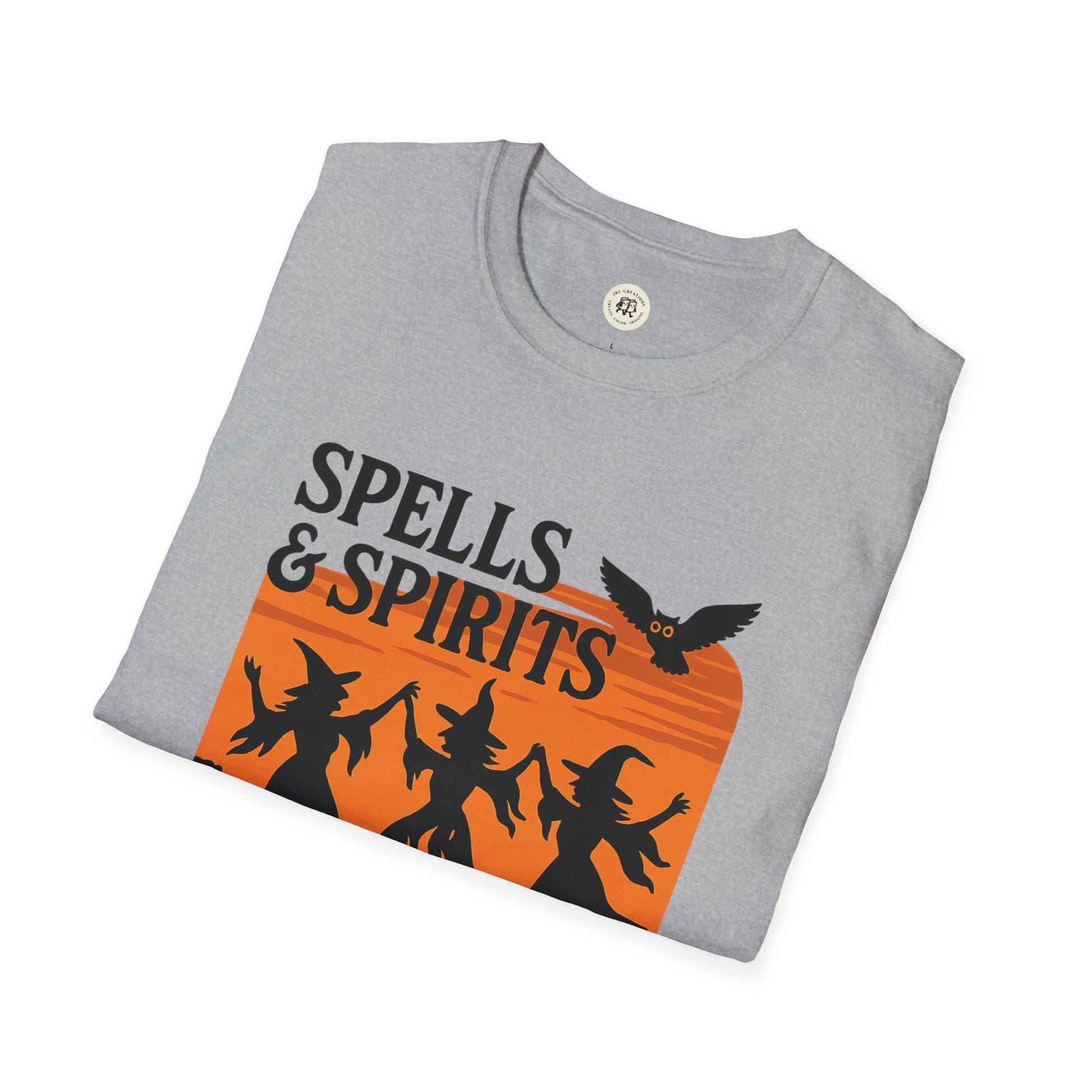 Grey folded Printify t shirt with orange sunset witches and owl Spells and Spirits design spooky vibes unisex halloween t-shirt