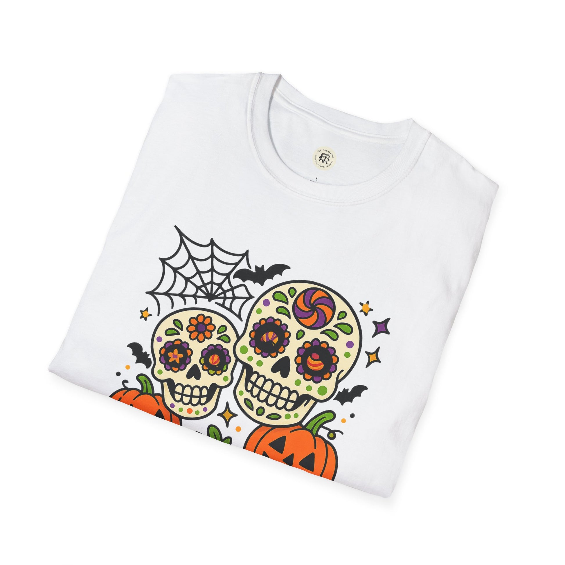 Printify white folded tshirt with colorful sugar skulls pumpkins bats and web boo-tiful soul halloween t-shirt design