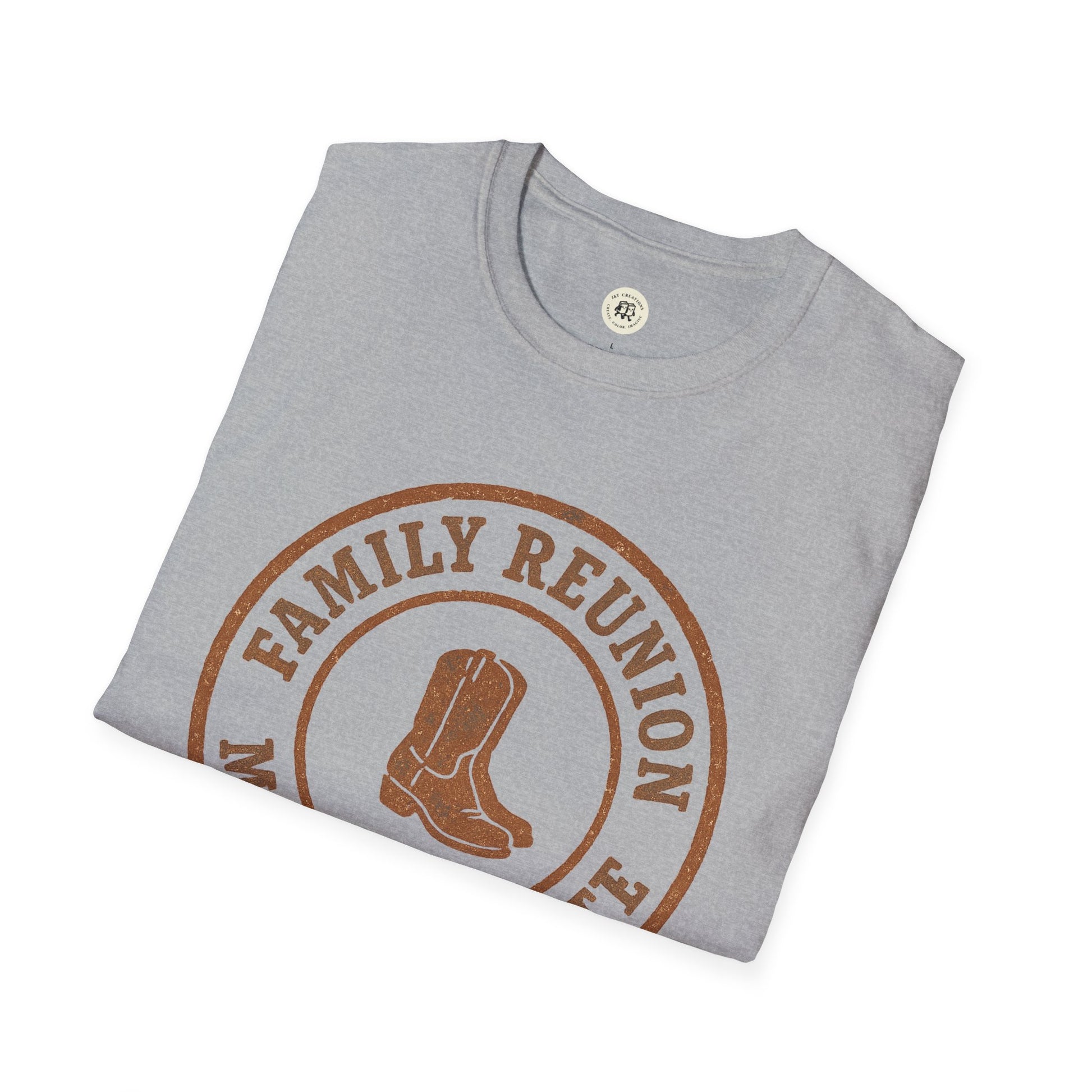 Gray Printify family reunion t-shirt with brown cowboy boots graphic folded neatly