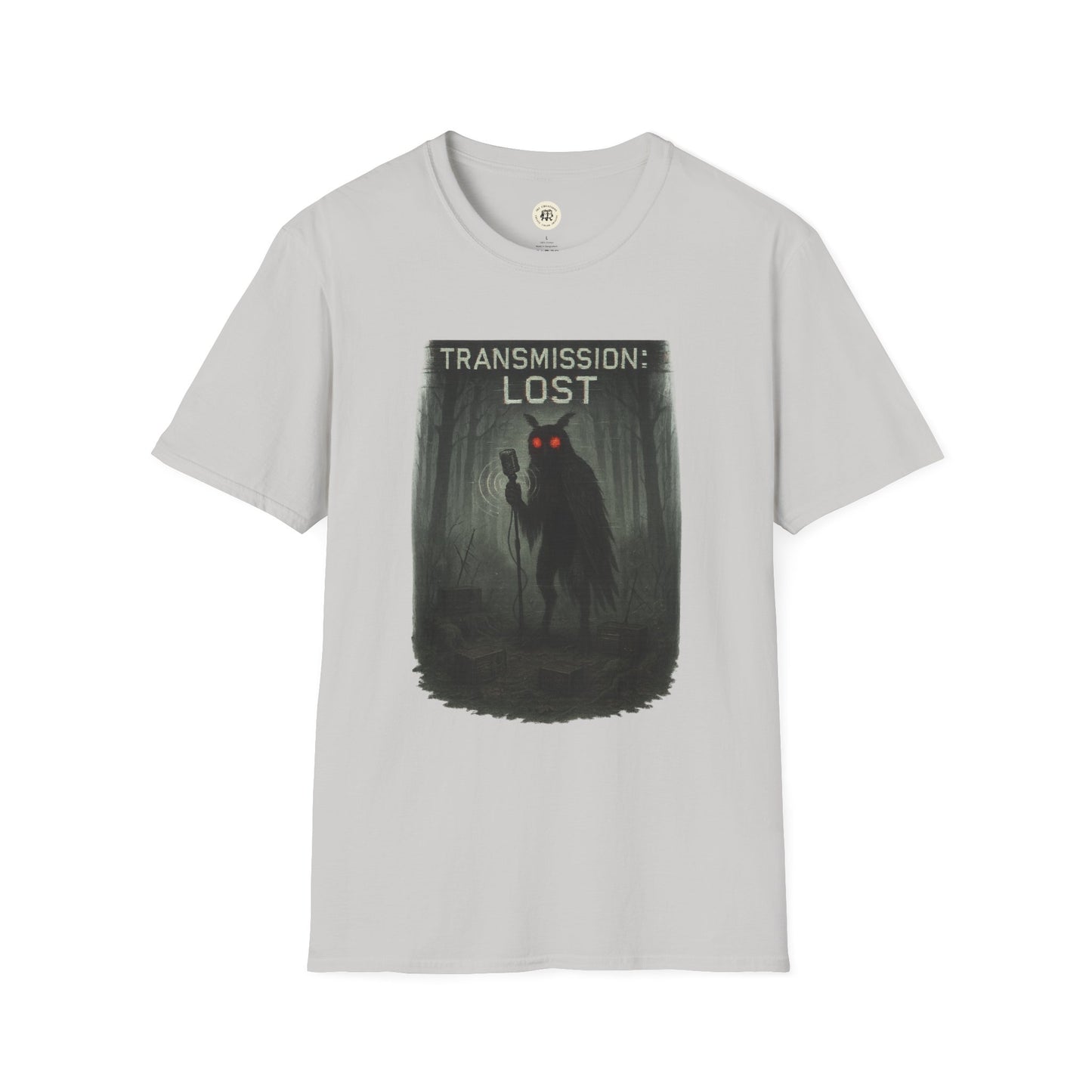 Gray Printify t-shirt with mysterious lost transmission t-shirt design featuring a dark figure with red eyes in a foggy forest