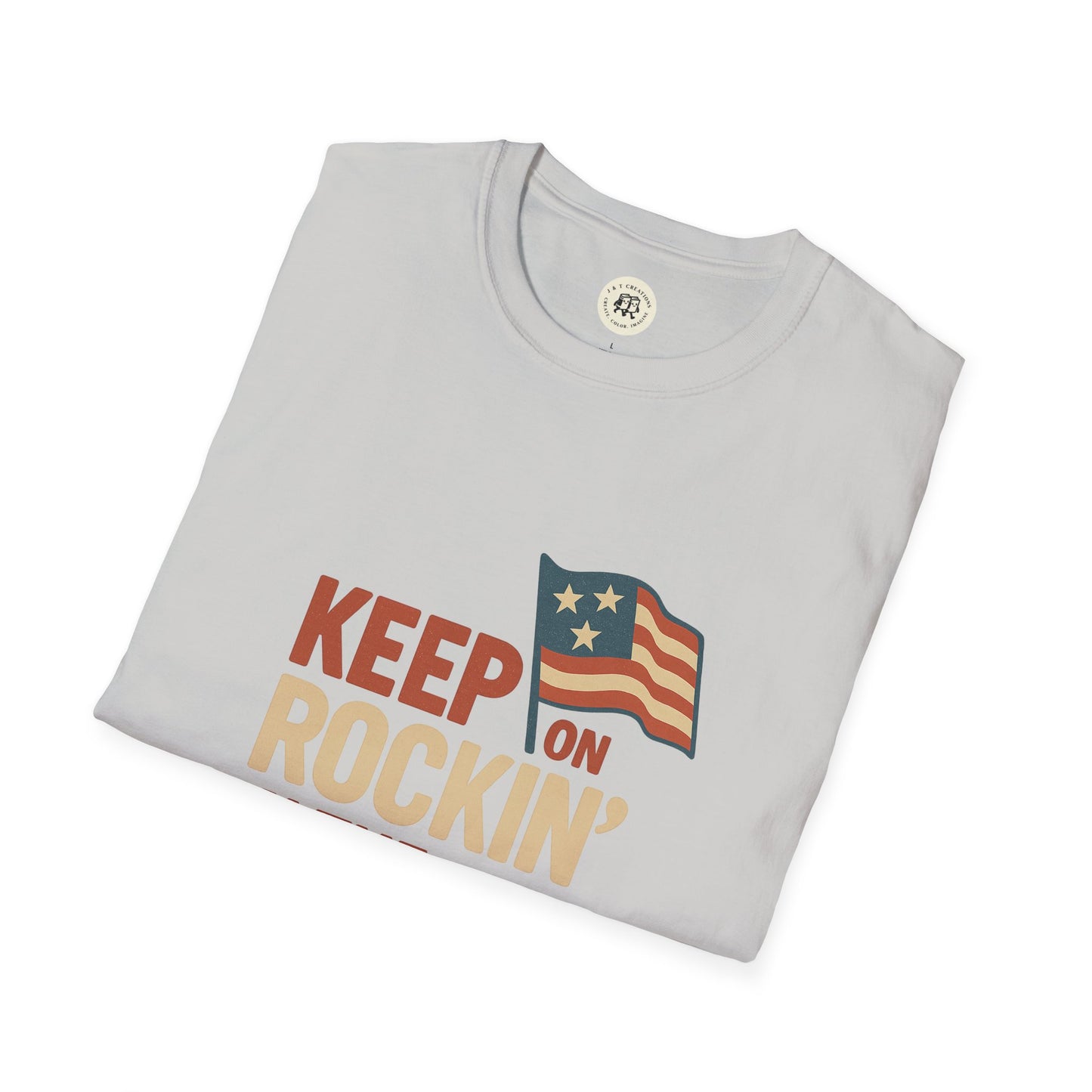 Folded light gray Keep on Rockin in the Free World shirt with vintage American flag design