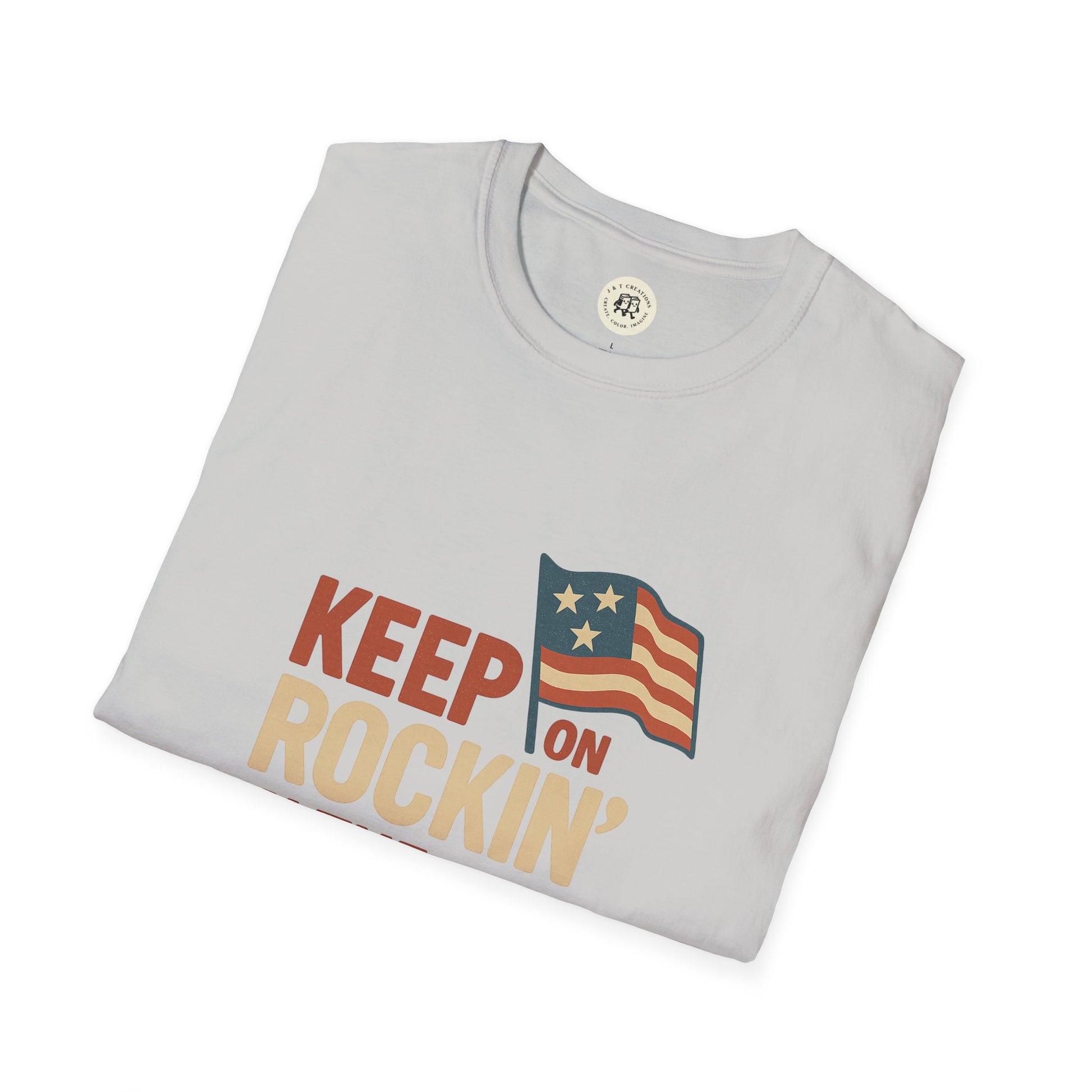 Folded light gray Keep on Rockin in the Free World shirt with vintage American flag design