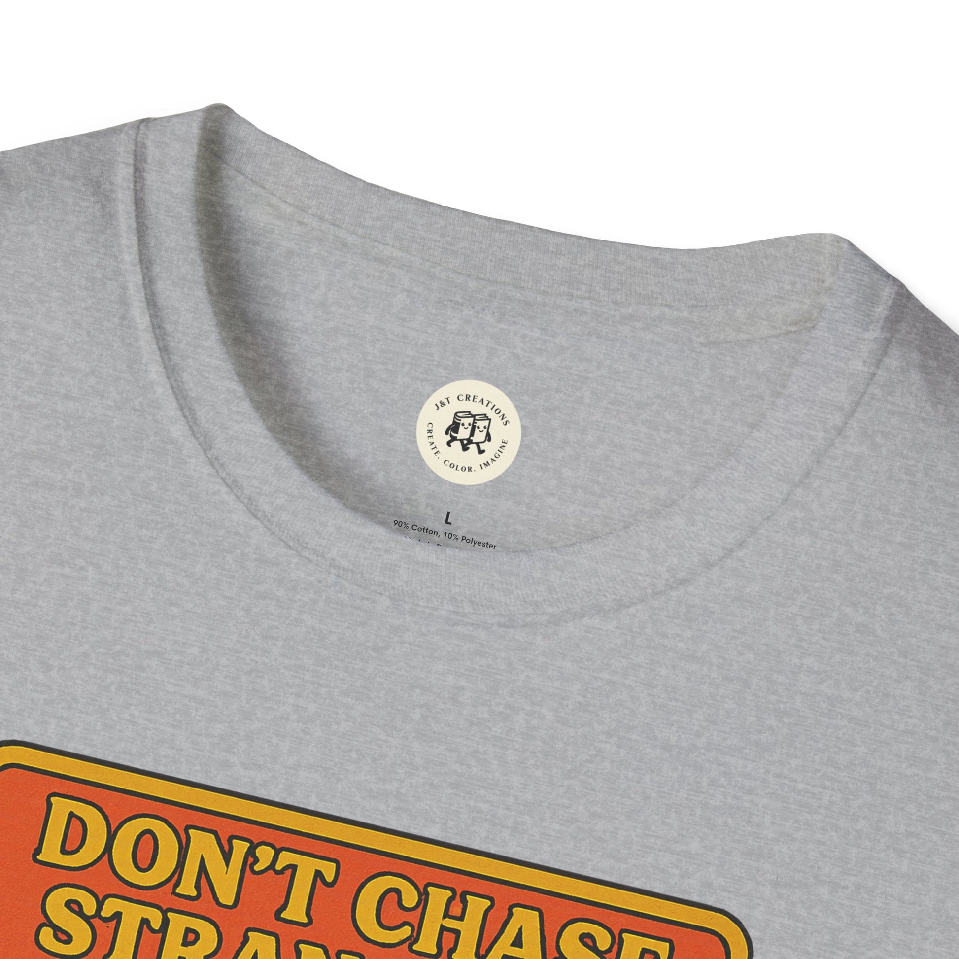 Close-up of grey Printify Moby Dick graphic t-shirt with round neckline and colorful text design