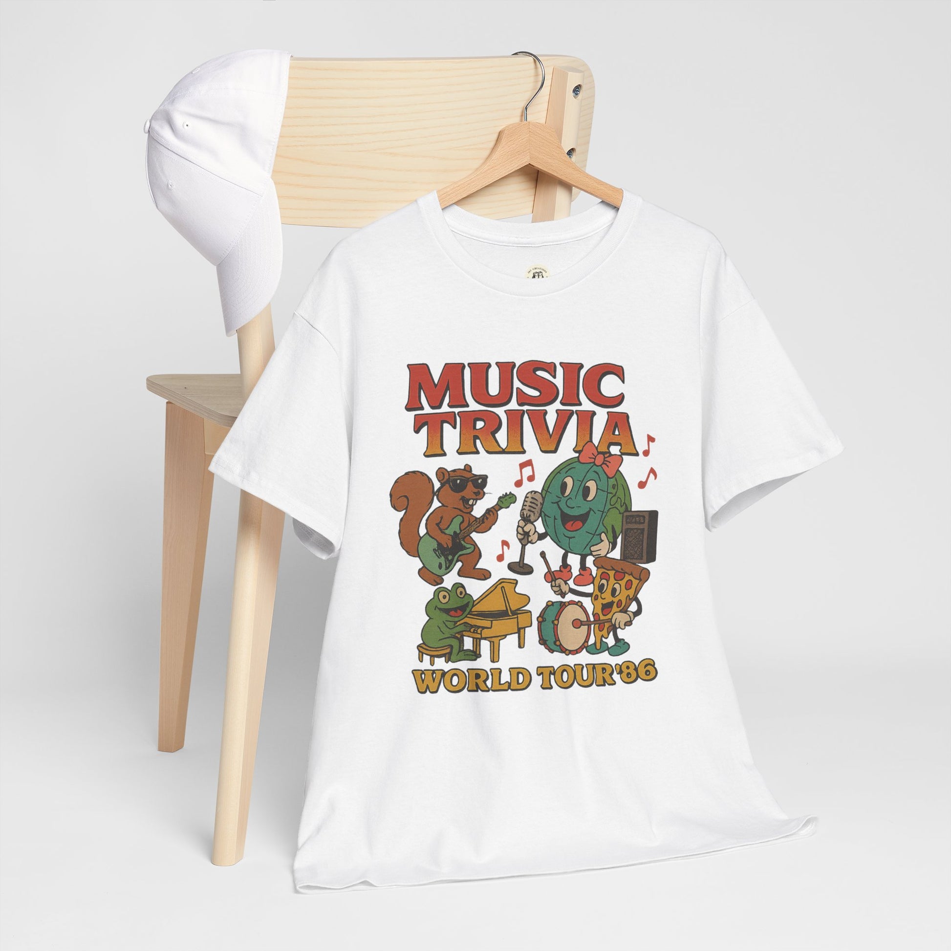 White Printify music trivia t-shirt featuring cartoon animals playing instruments and pizza on a chair