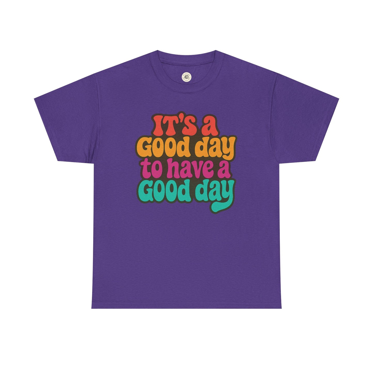 Purple positive vibe t-shirt with colorful retro text saying It’s a good day to have a good day