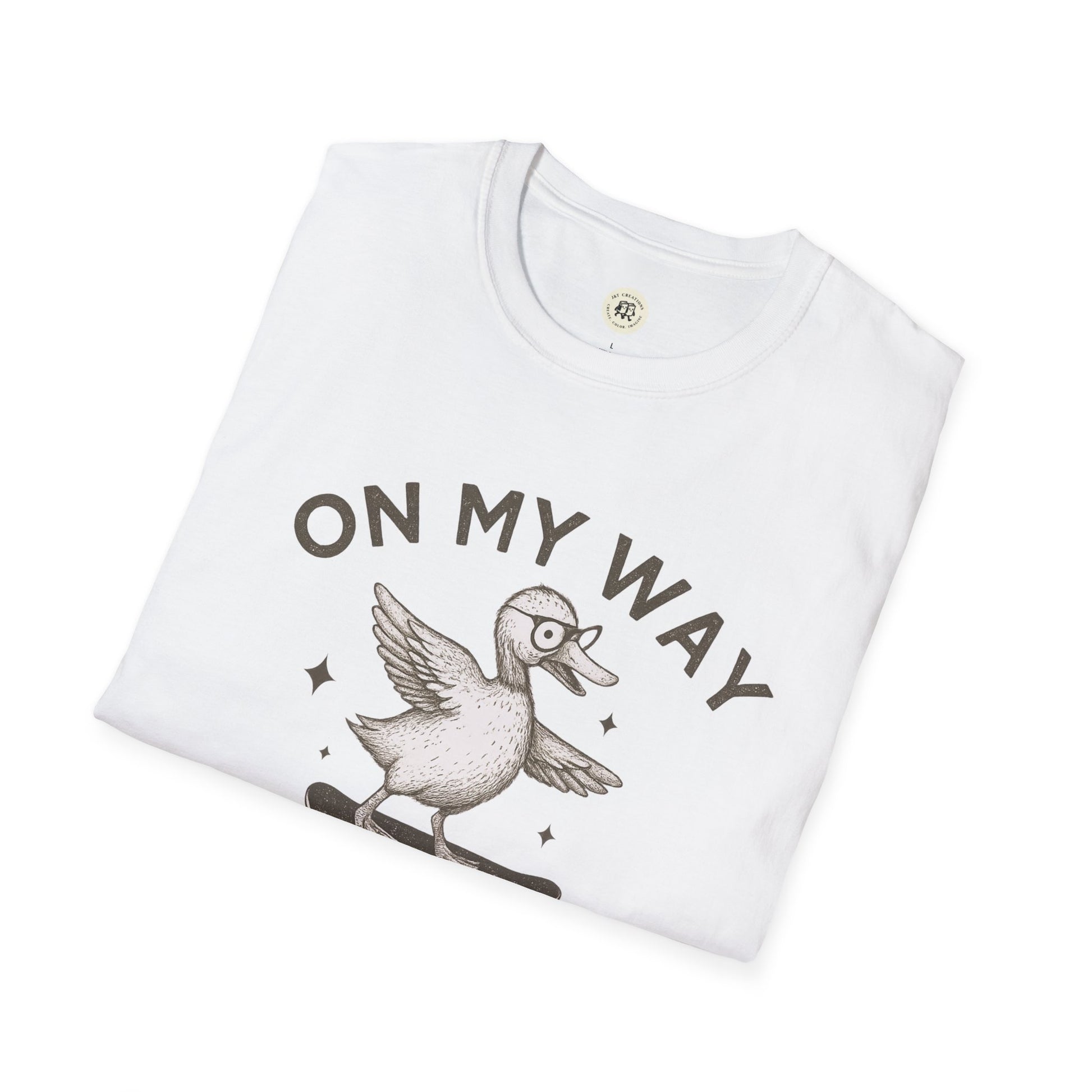 White quirky duck t-shirt with cartoon duck and on my way text folded flat from Printify