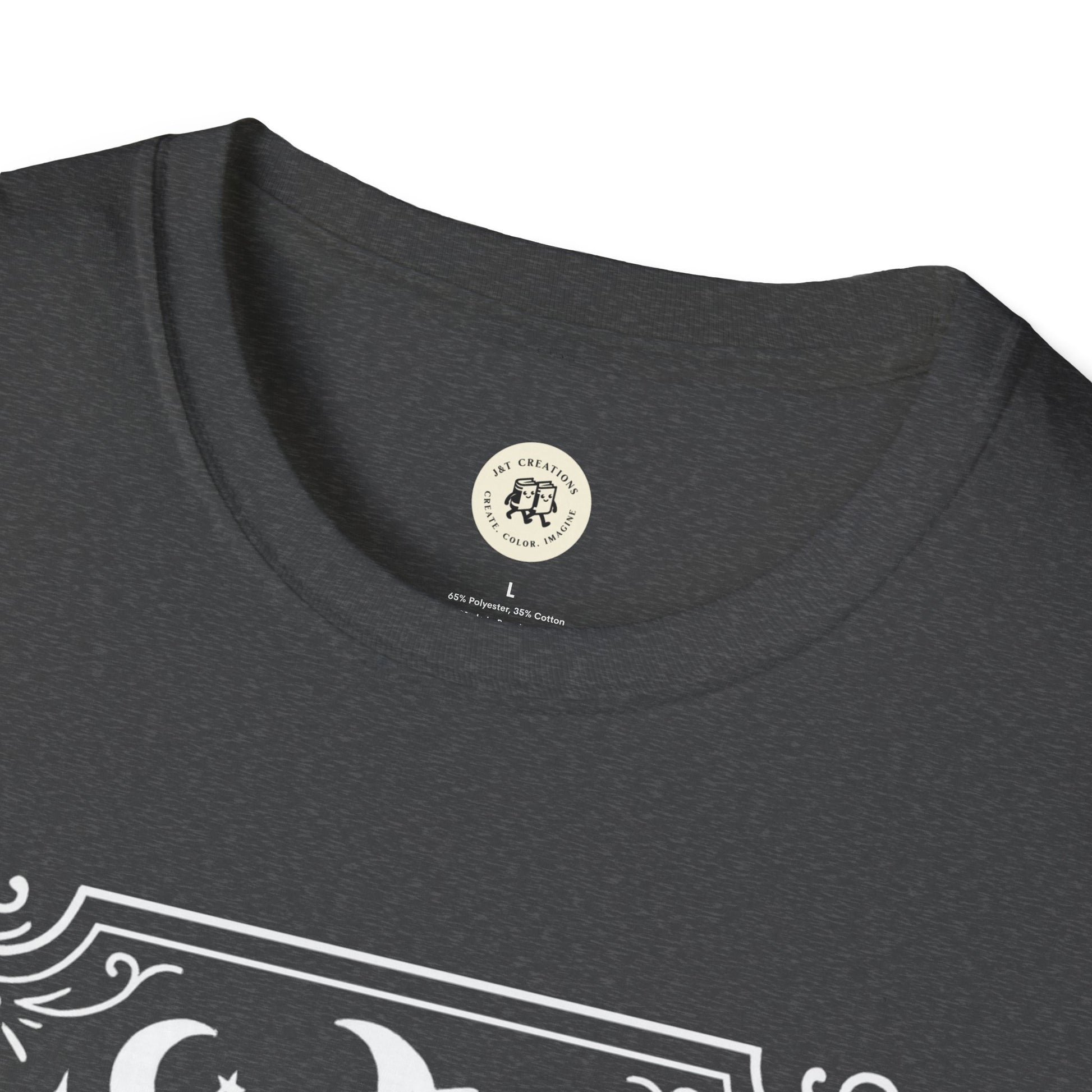 Close-up of the neckline on a dark gray Salem Broom Co. t-shirt by Printify with white printed design