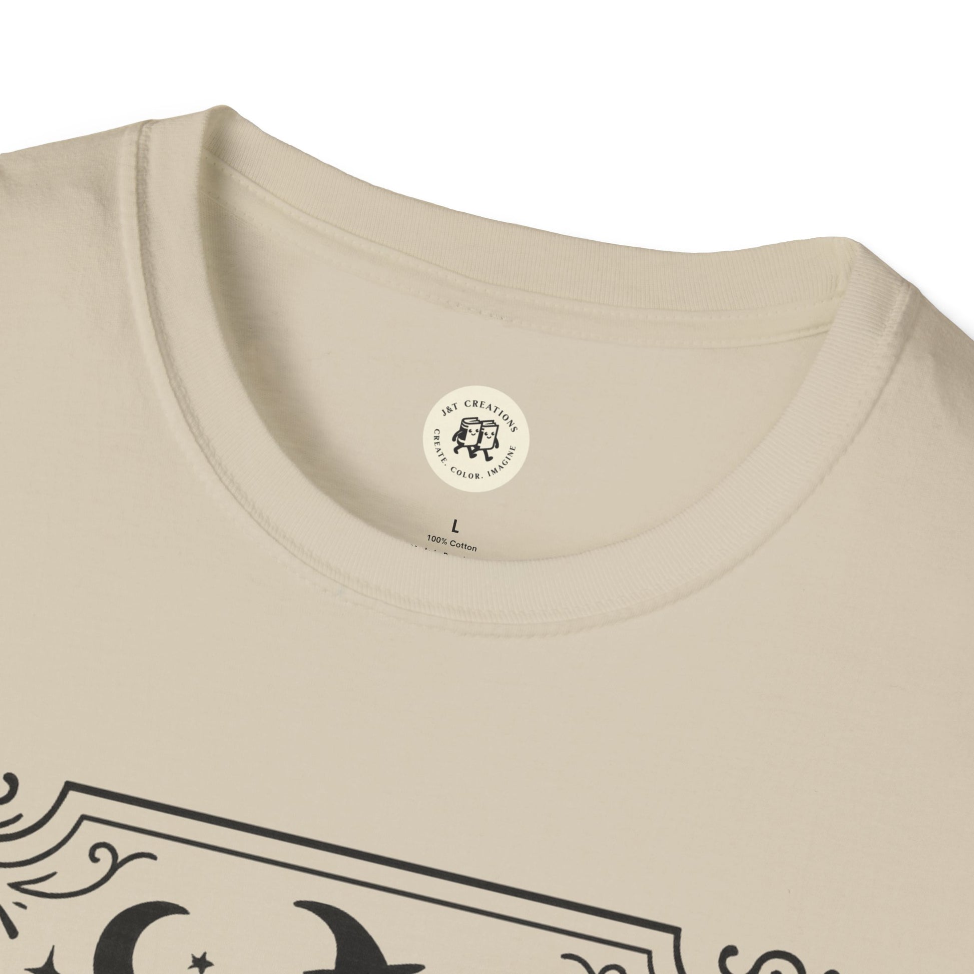 Close-up of cream Printify witchy Halloween t-shirt collar and partial graphic design