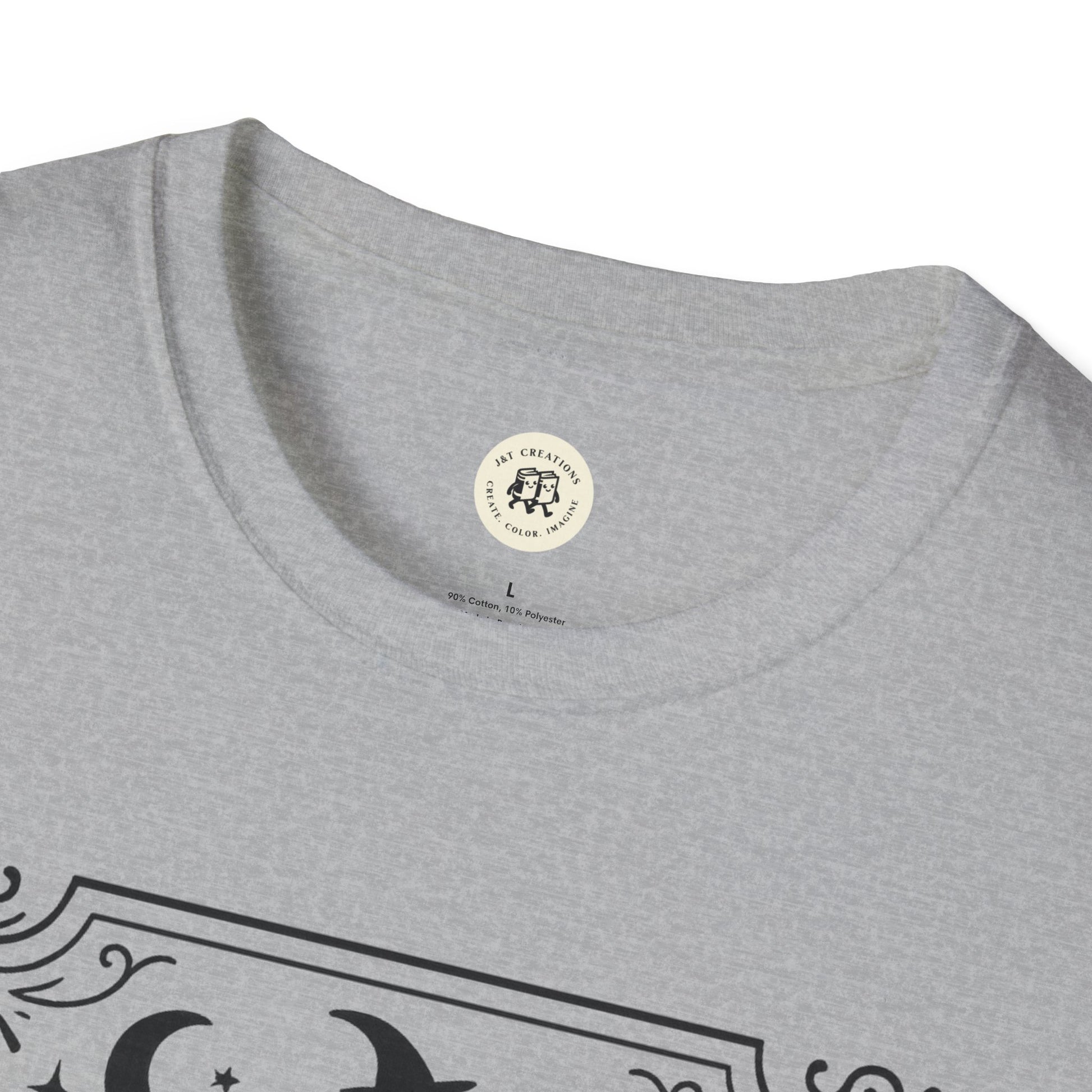 Close-up of Printify gray witchy Halloween t-shirt collar and tag with black design details