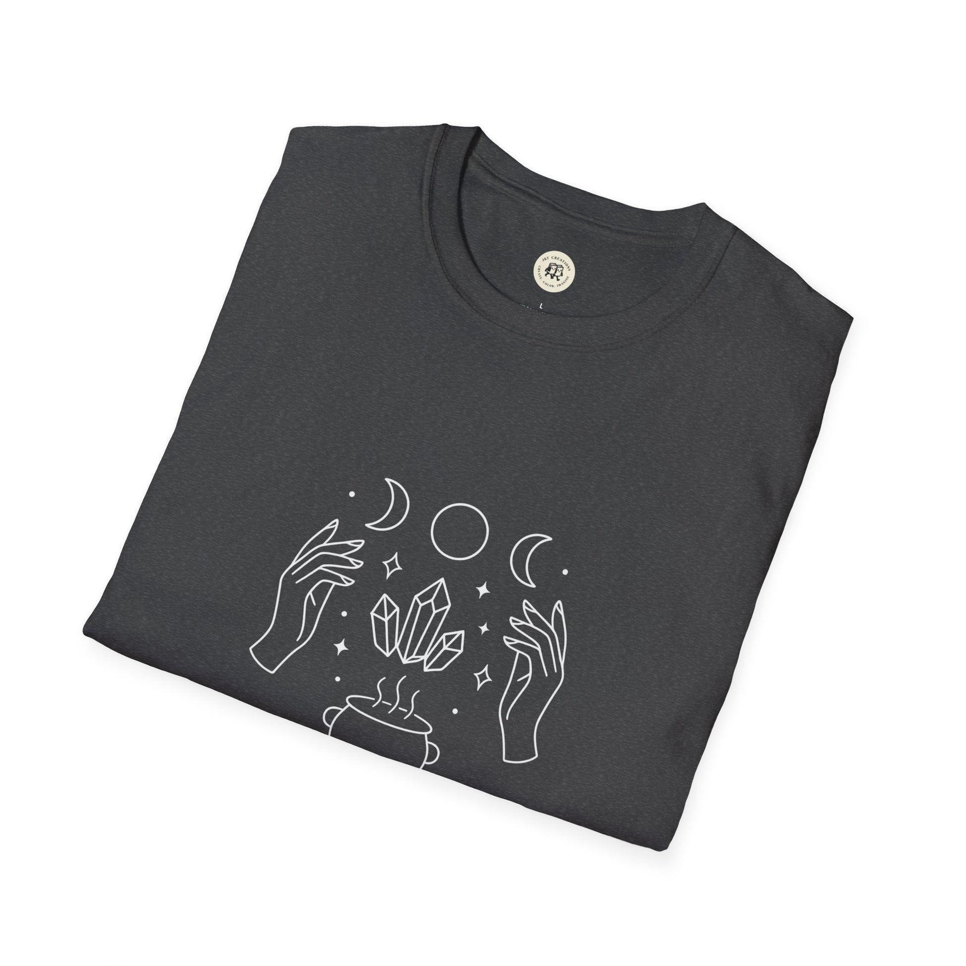 Folded charcoal shirt with white line art hands crystals cauldron and moon phases witchcraft t-shirt unisex