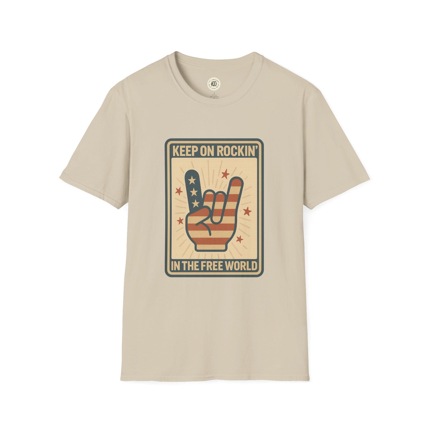 Beige Keep on Rockin in the Free World t-shirt with American flag hand rock gesture graphic