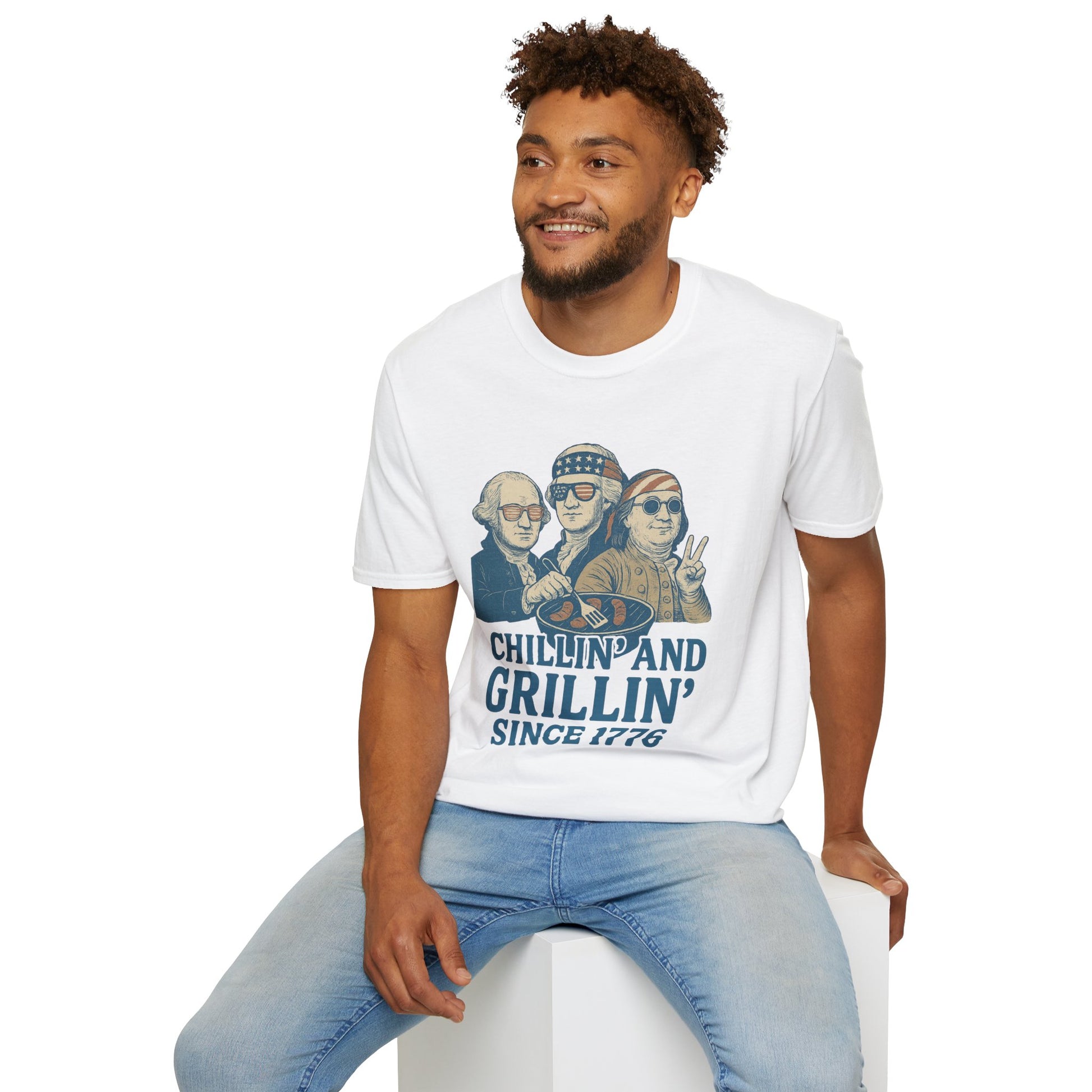 Printify vintage 4th of July t-shirt with Chillin and Grillin graphic worn by man sitting
