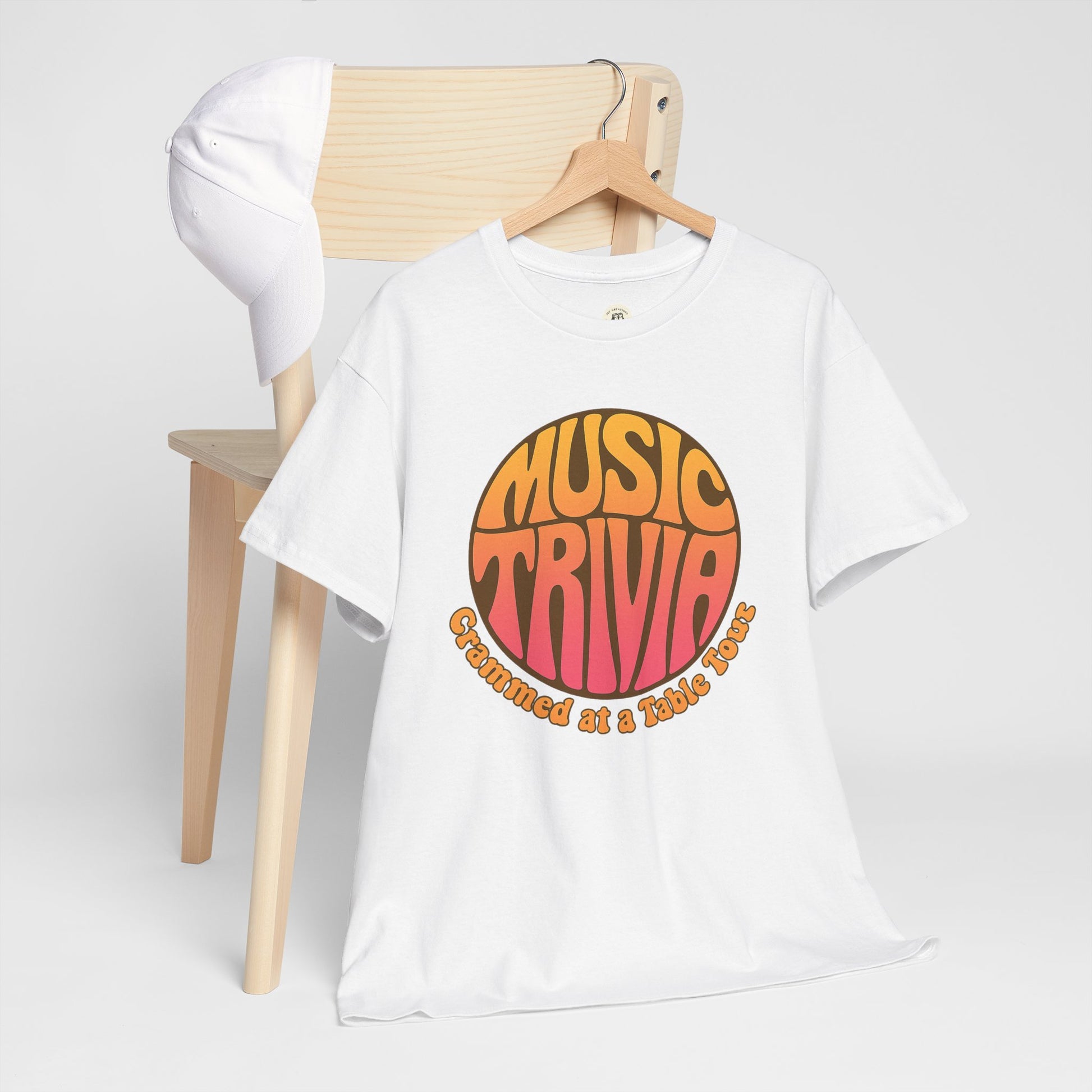 Printify vintage music trivia t-shirt in white with colorful retro text design hanging on wooden hanger